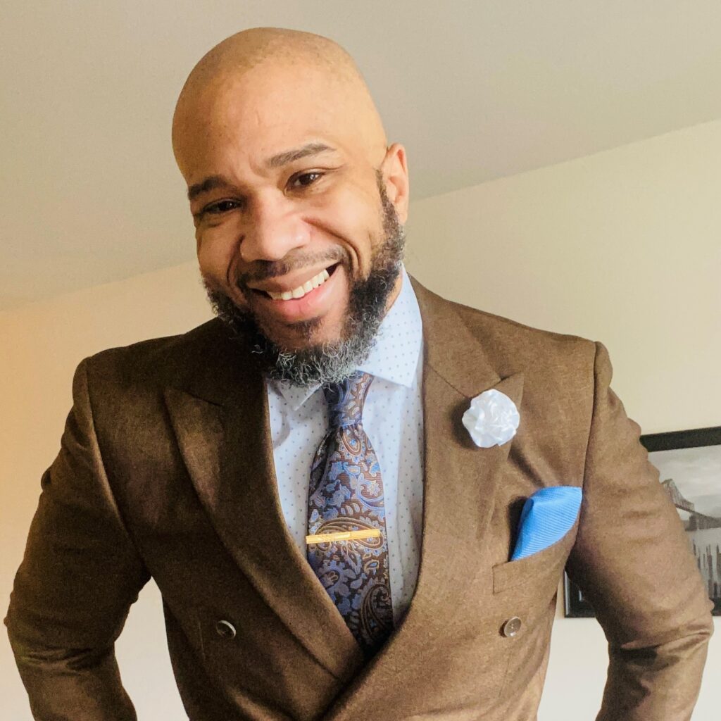 Senior Vice President, Delmar Algee, III, posing for a picture